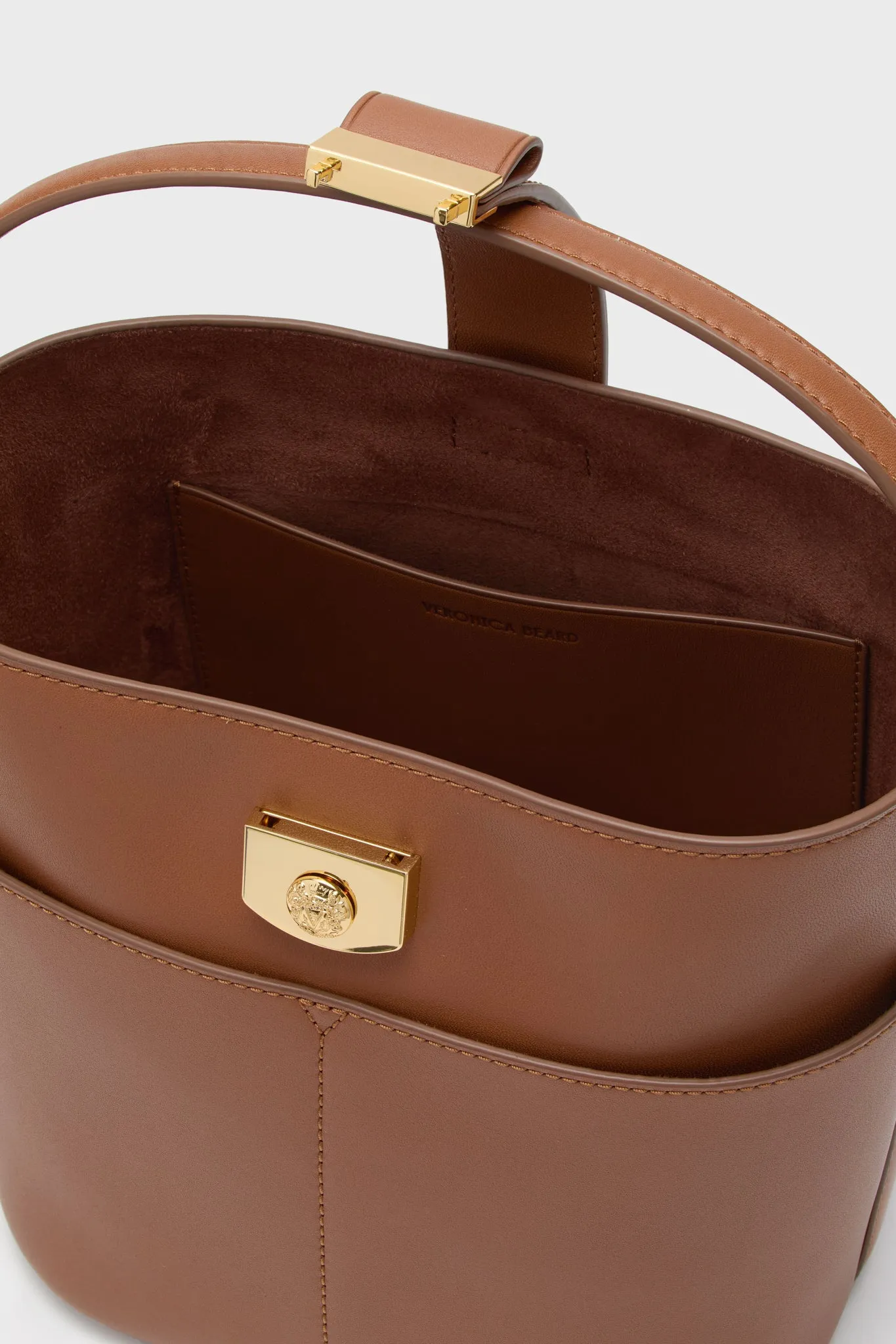 Hazelwood Small Crest Lock Bucket Bag