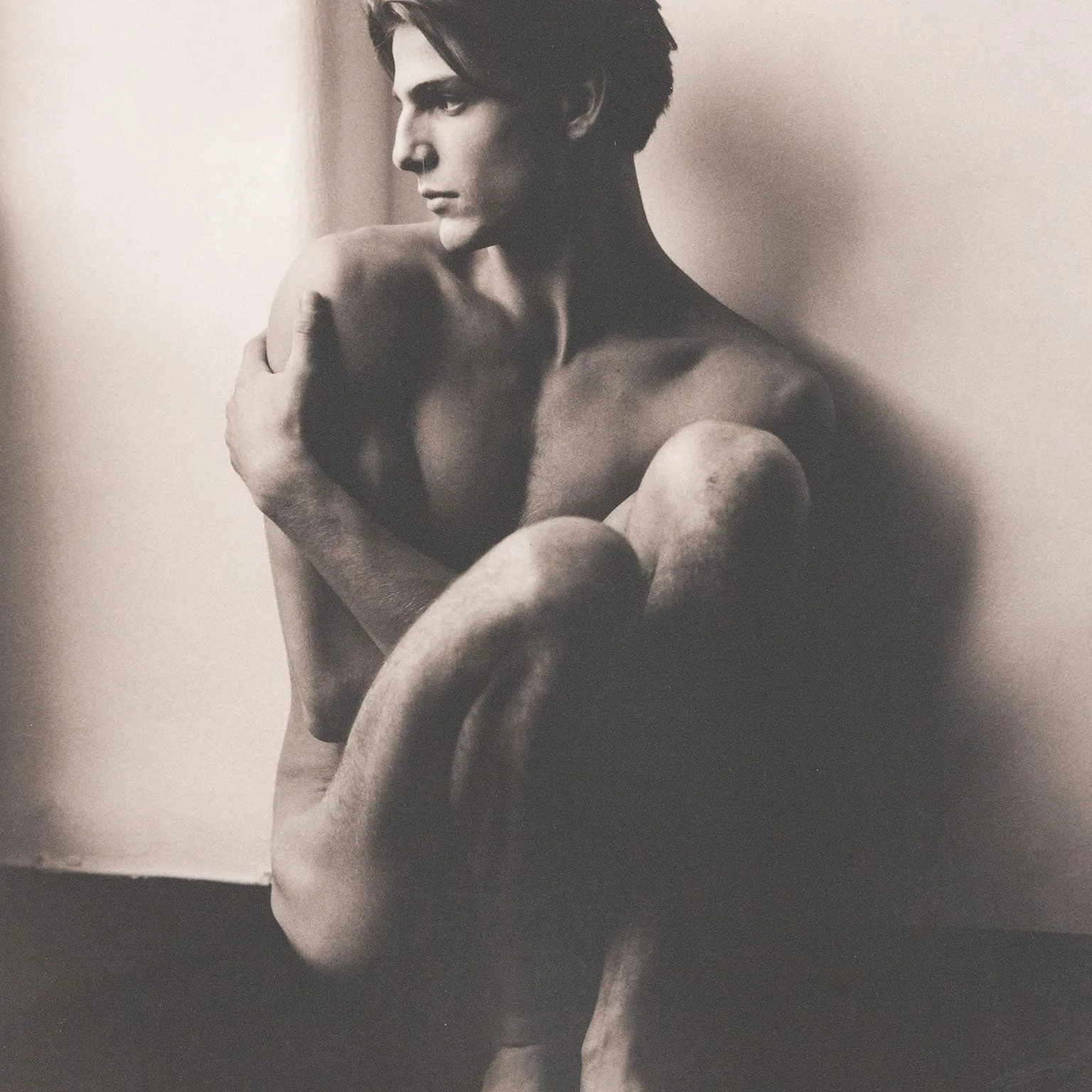 HERB RITTS "STEFANO SEATED" PLATINUM PRINT PHOTOGRAPH, 1985