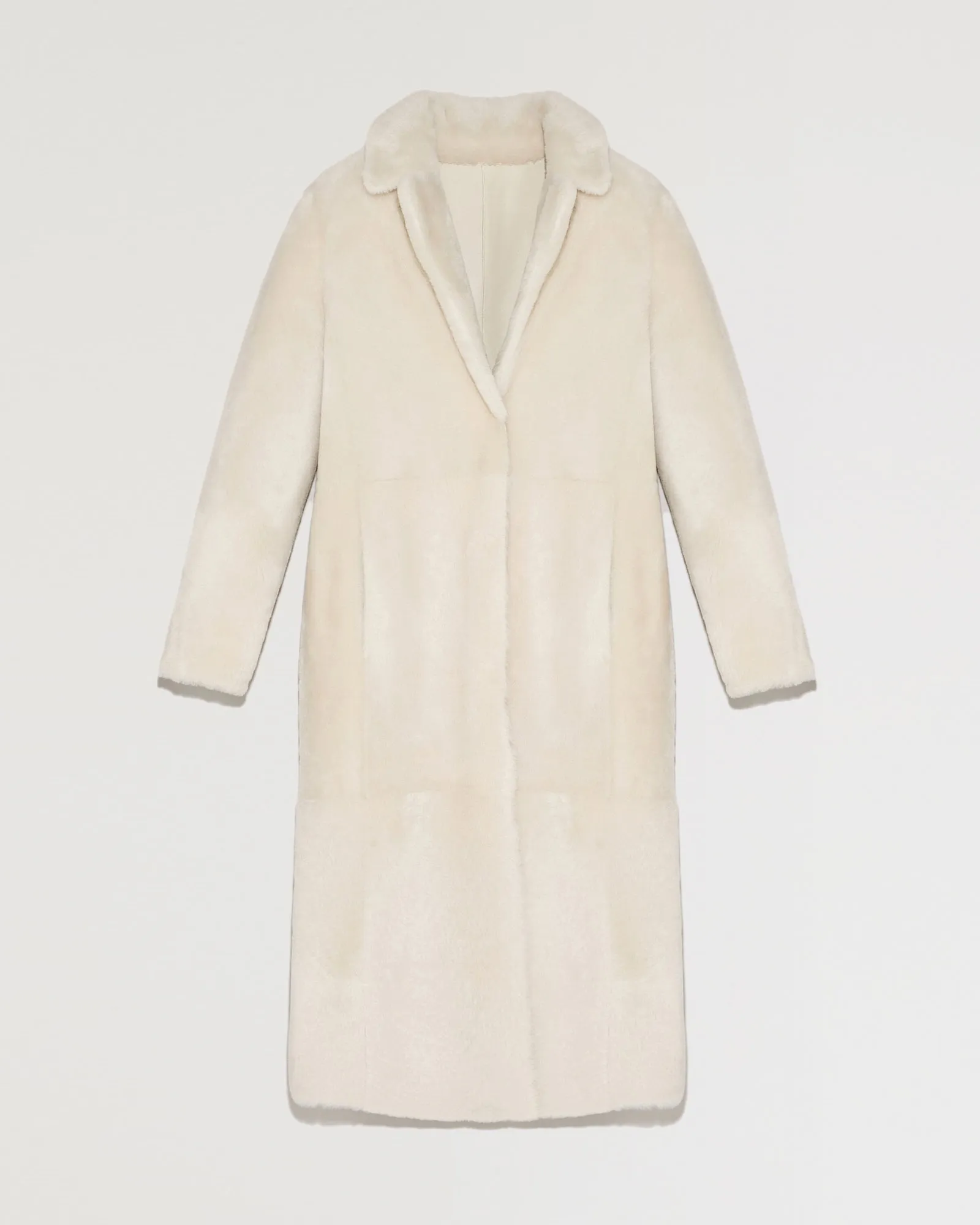Long reversible belted shearling coat