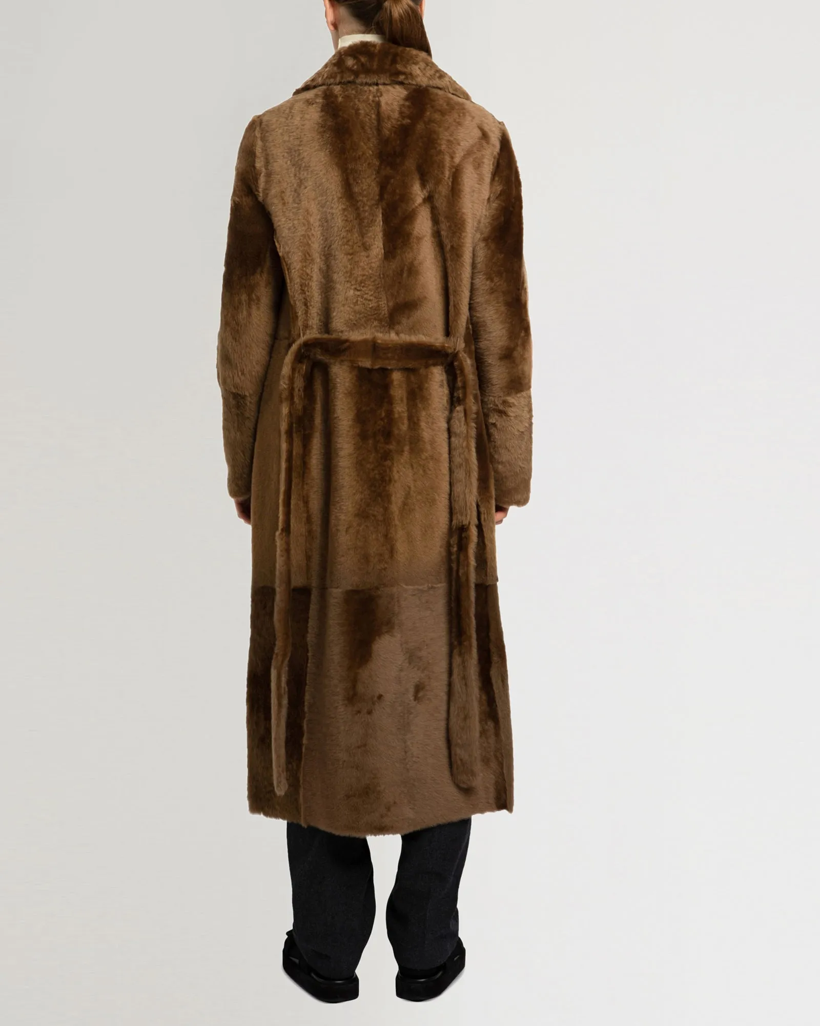 Long reversible belted shearling coat