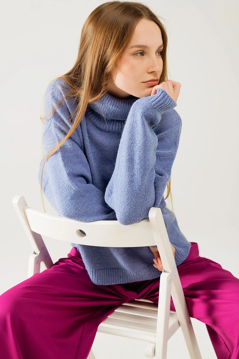 Loose blue sweater with dropped sleeves