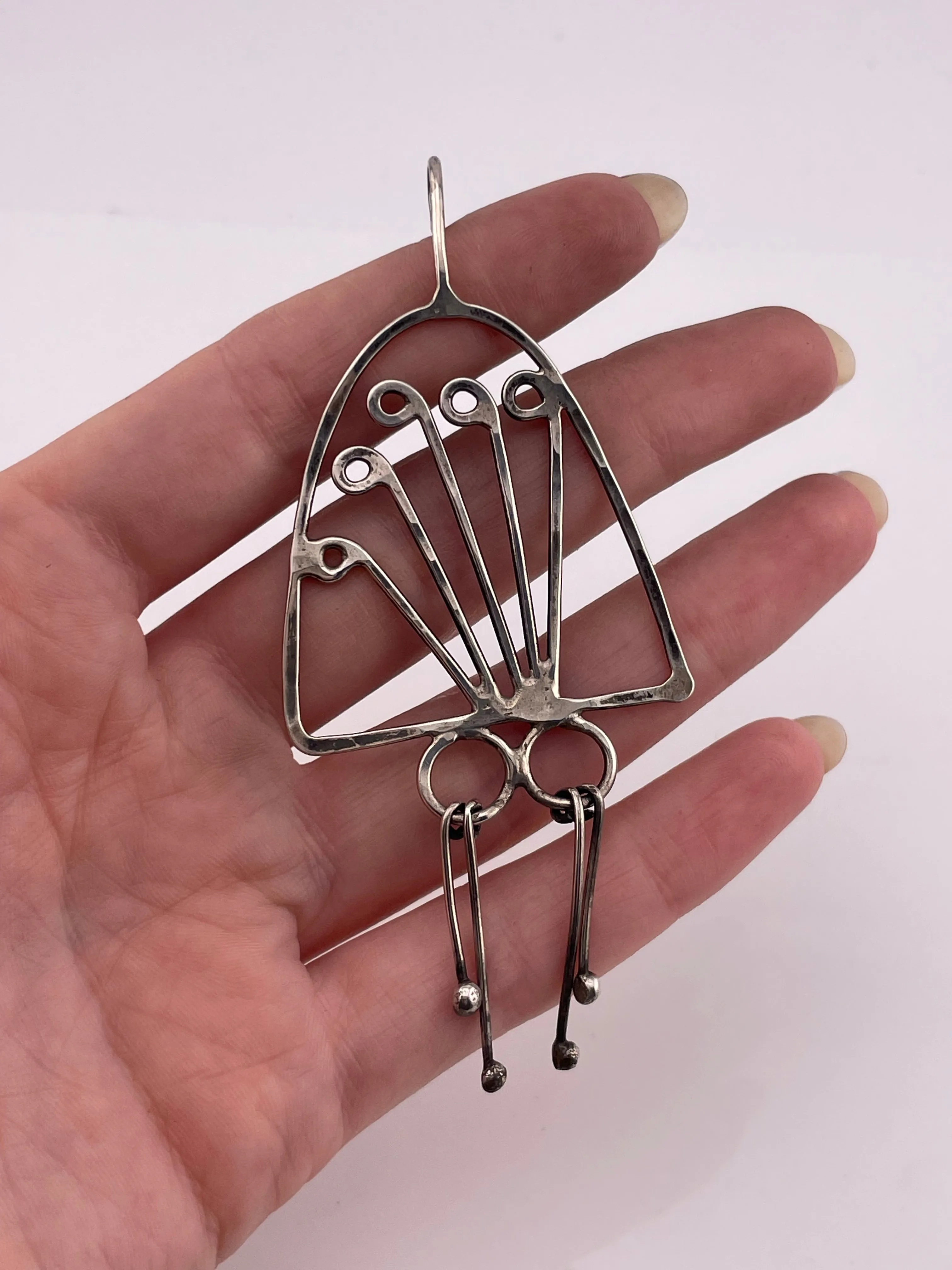 sterling silver artisan stoneless dangle pendant