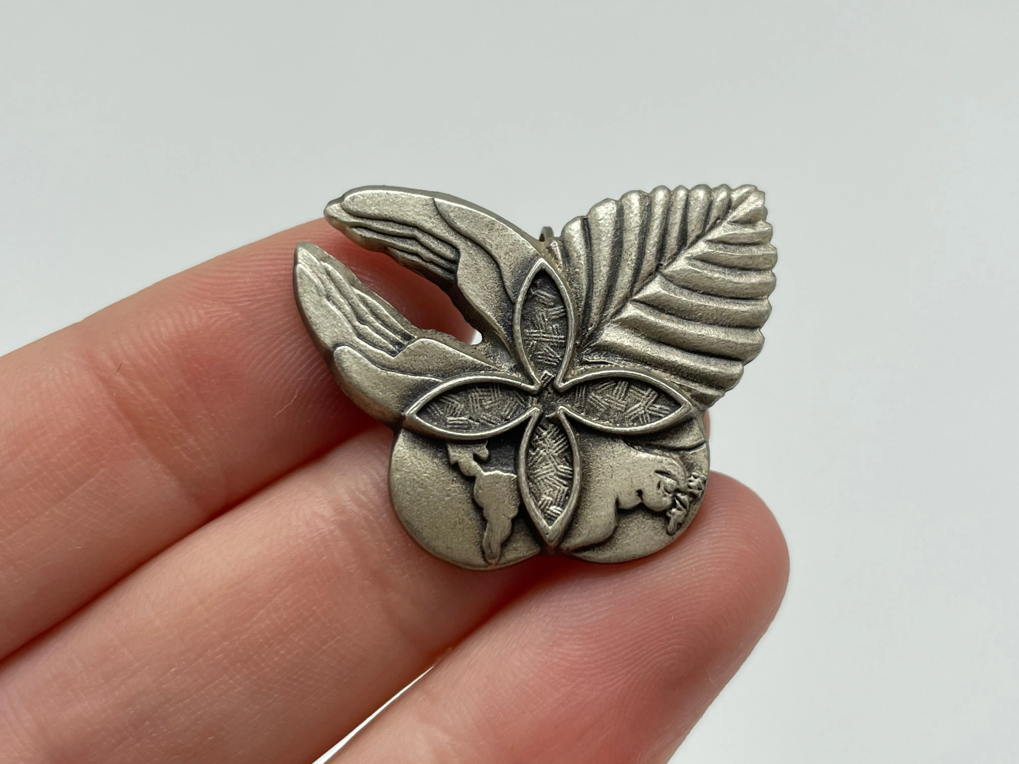 sterling silver earth hands leaf pendant / brooch