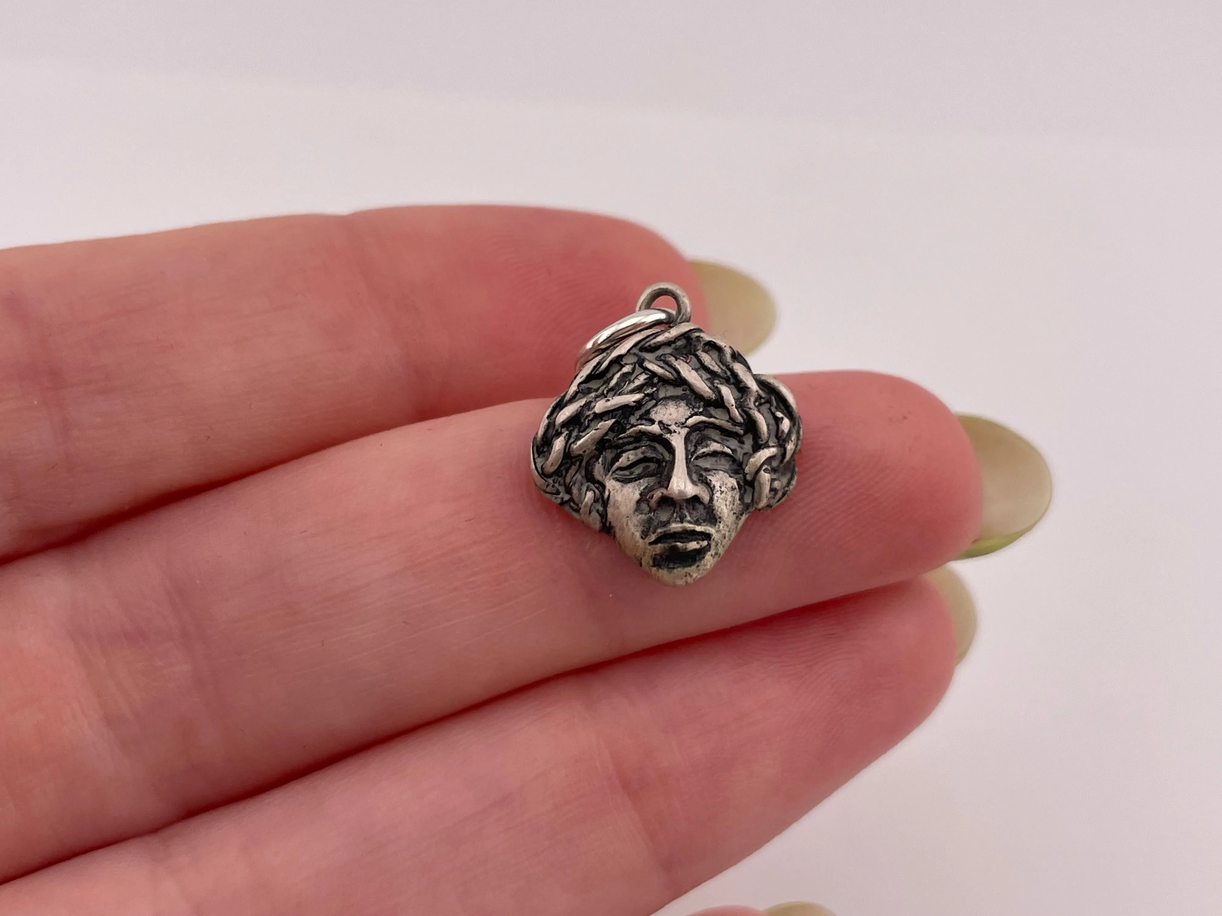 sterling silver face pendant