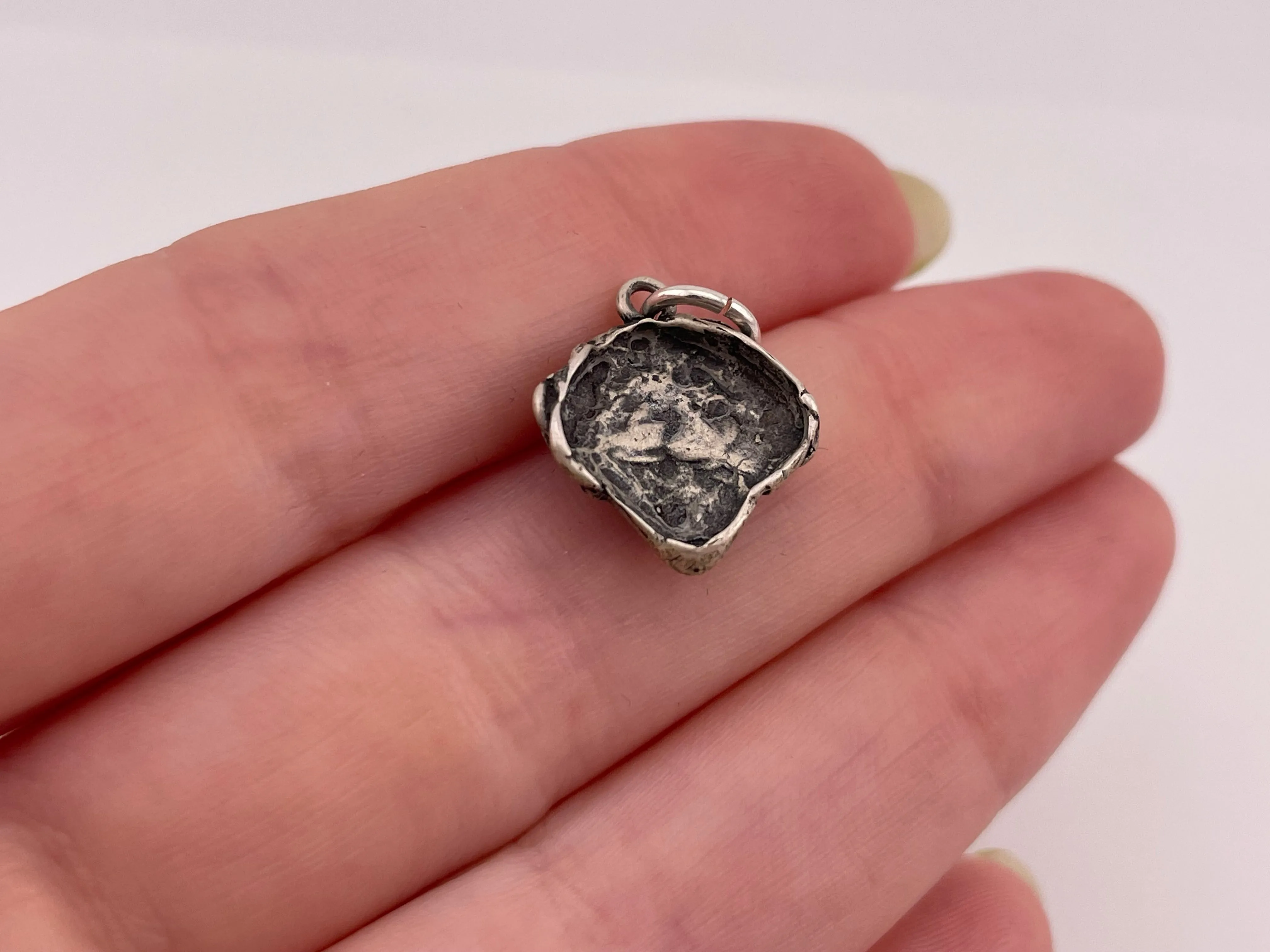 sterling silver face pendant