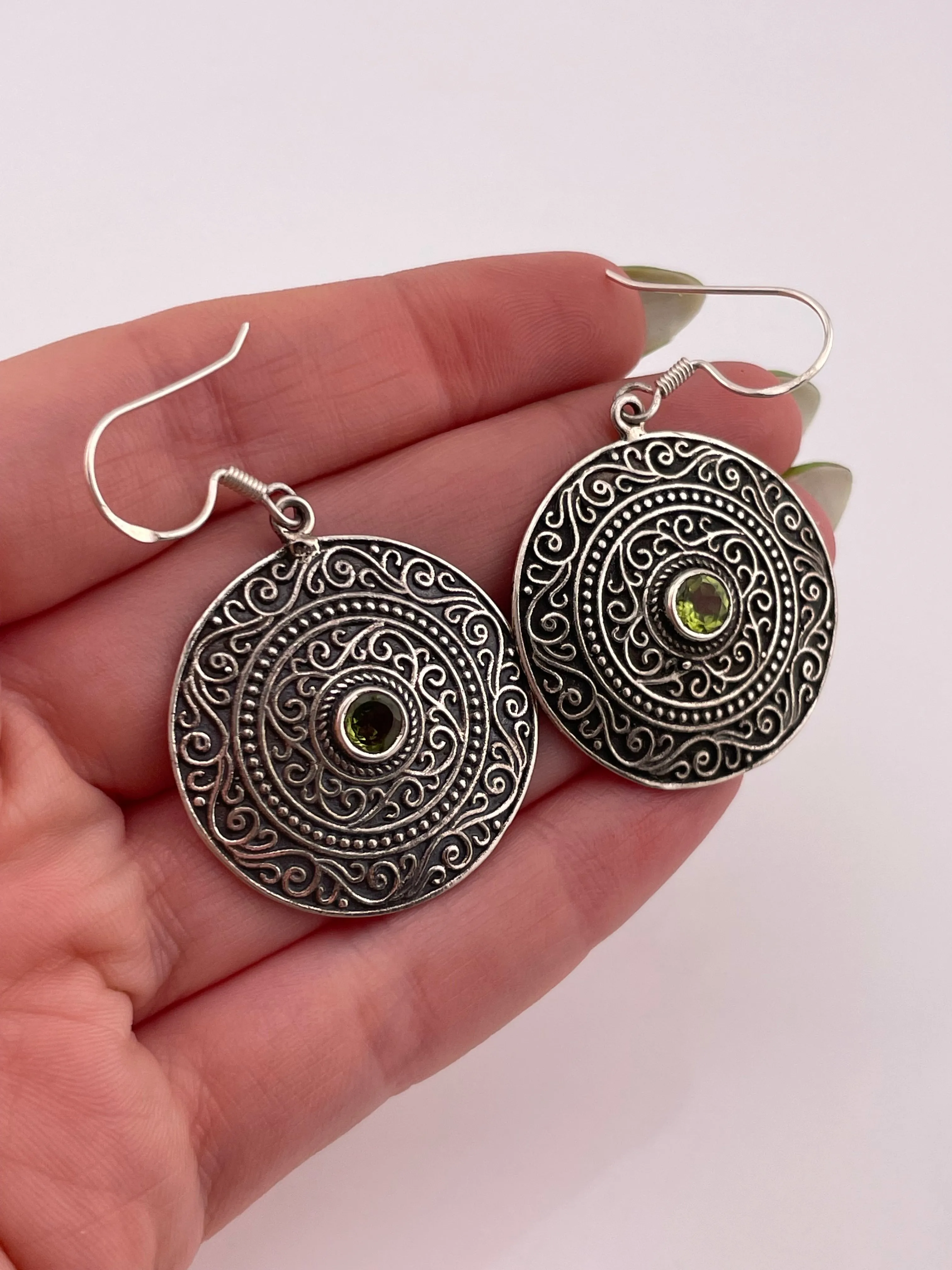 sterling silver faceted peridot dangle earrings