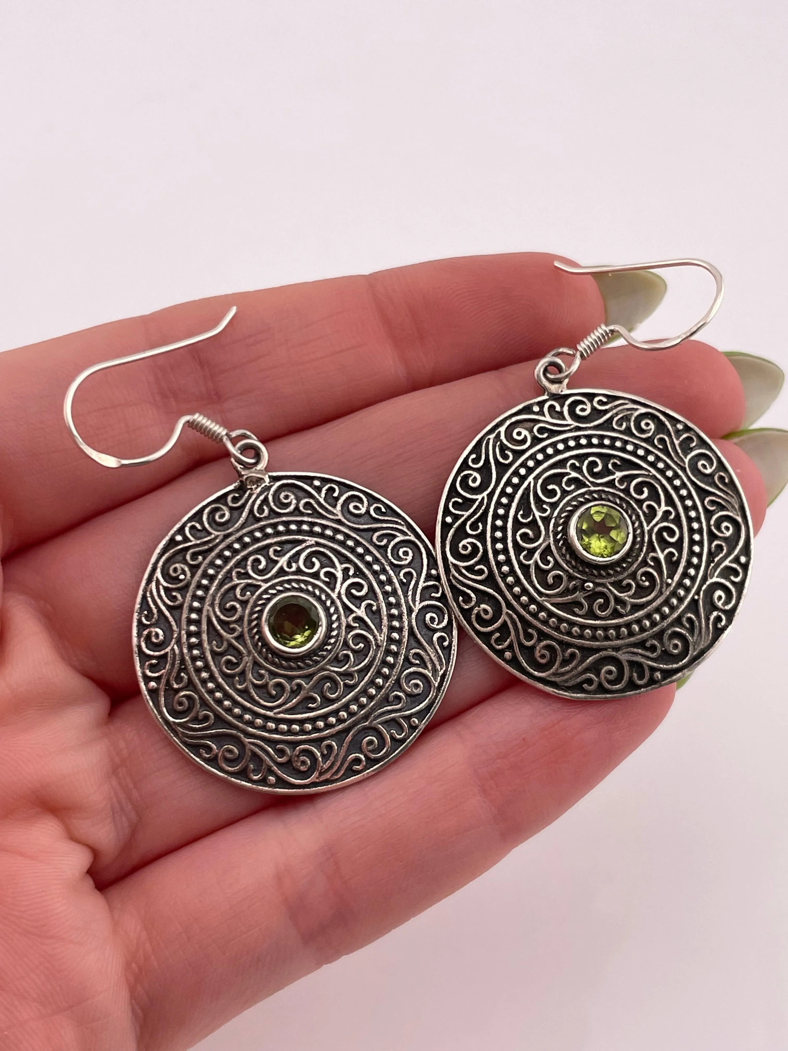 sterling silver faceted peridot dangle earrings