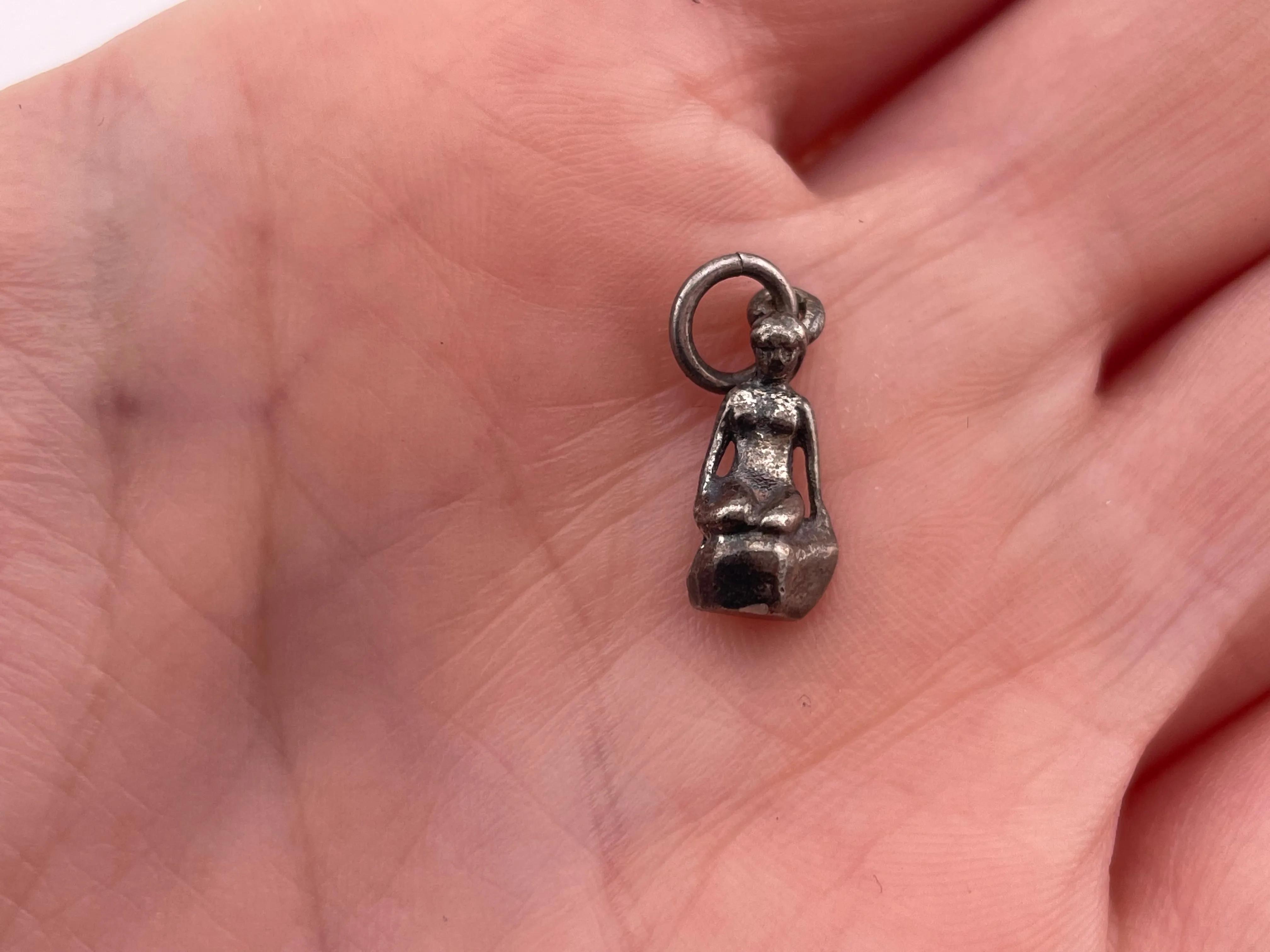 sterling silver lady on rock pendant