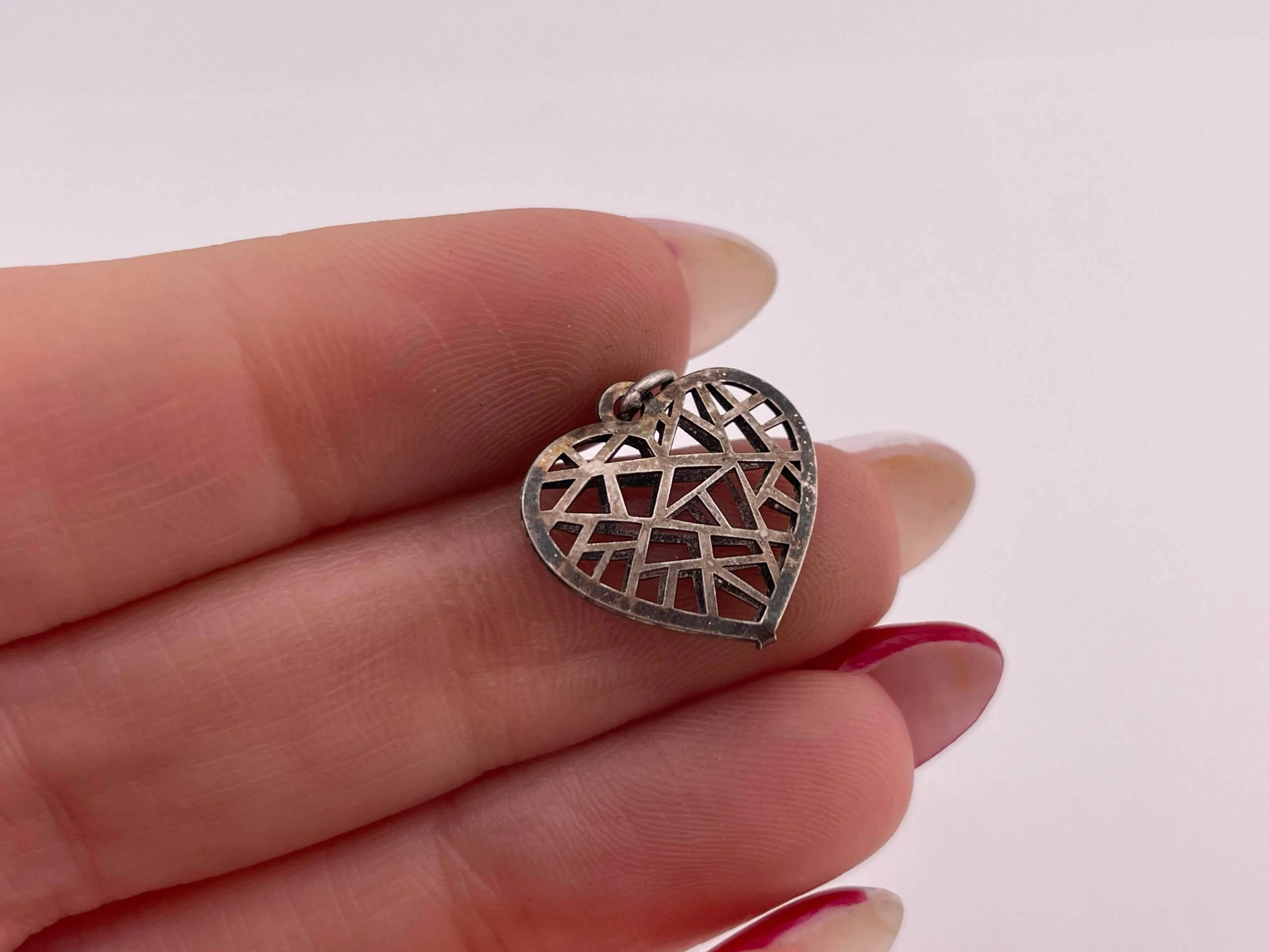 sterling silver small cut-out design heart pendant