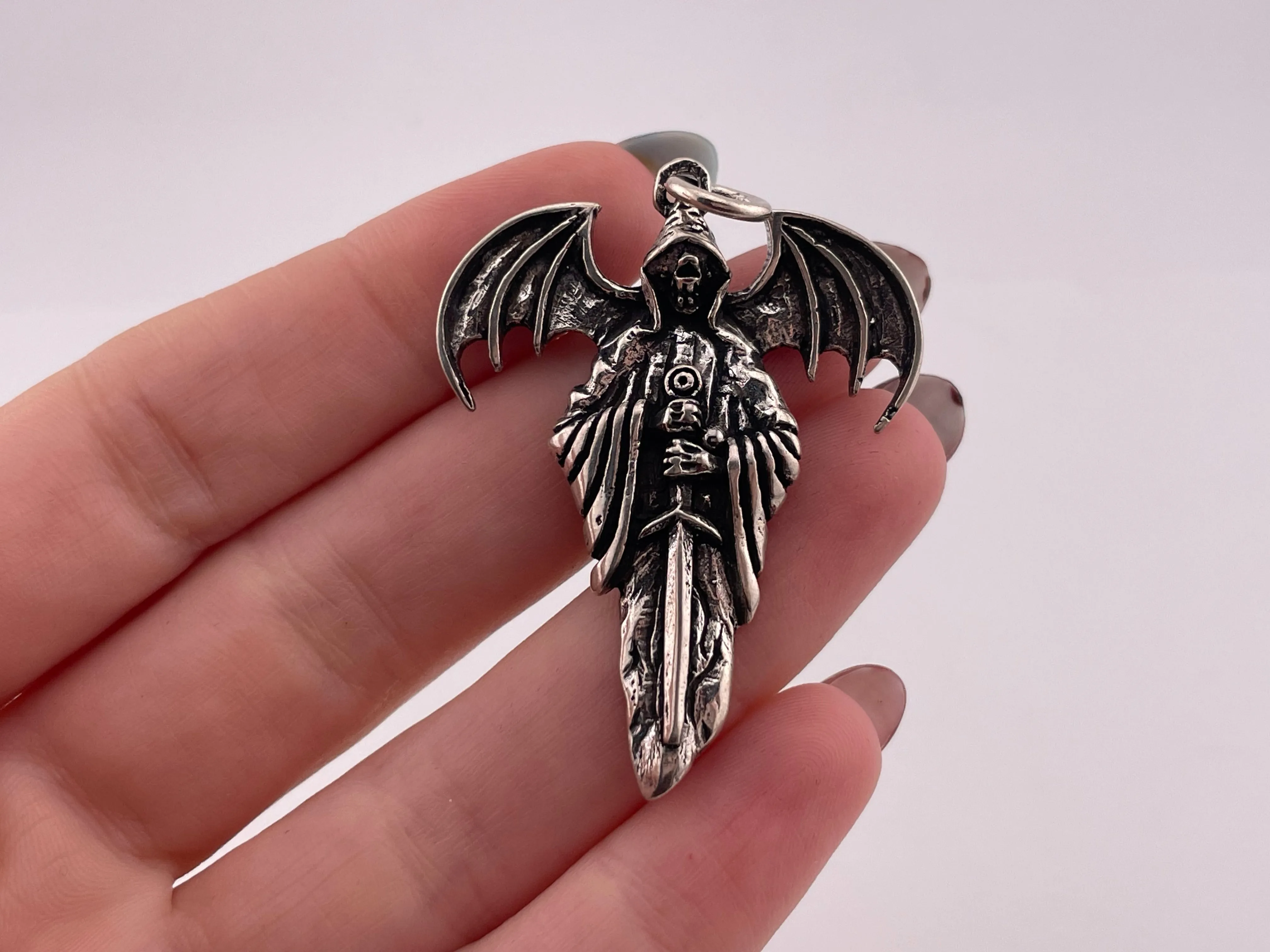 sterling silver winged demon sword pendant